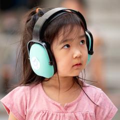 Child with headphone on