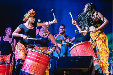 Photos of the band Extra Ancestral performing on an outdoor stage at the Skirball