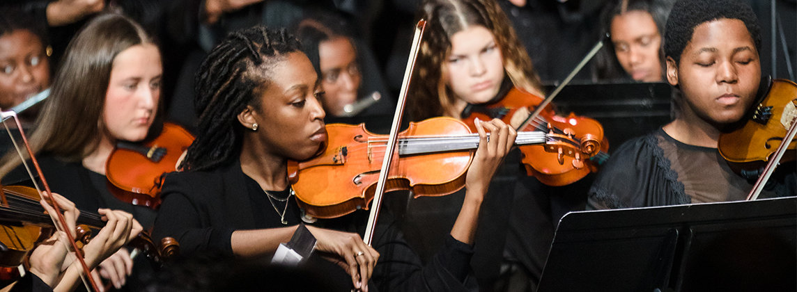 A group of musicians playing instruments at the Martin Luther King Jr. Day Celebration Concert 2020