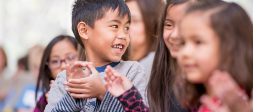 young children smiling