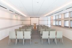 Bergreen Boardroom showing chairs arranged in rows facing a video projection screen