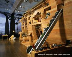 view of Noah's Ark with small animals going up ramp