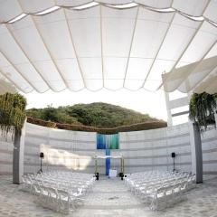 Founders Courtyard with rows of chairs and a chuppah